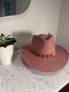 "With Florida sunsets and sunrises in mind ... feast your eyes on my NEWEST creation -- the Tequilla Sunrise.  This wonderful beaded hat band measures 22.5\" long and 3/4\" wide.  It is finished on both ends with high-quality leather.  The beads are a mix of glass, toho and plastic.  This band comes with the leather tie (depicted) and the feathers depicted.  Feeling creative yourself? Don't hesitate to reach out regarding a custom band -- I'm here for you, and I'm here for it!!" Tequilla Sunrise, Sunsets And Sunrises, Beaded Hat Bands, Gifts For Her Birthday, Beaded Hat, Hat Decoration, Leather Tie, Chic Accessories, Hat Band