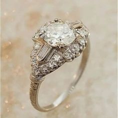 an engagement ring with diamonds on it