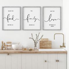 three framed art prints on the wall above a kitchen counter with dishes and utensils