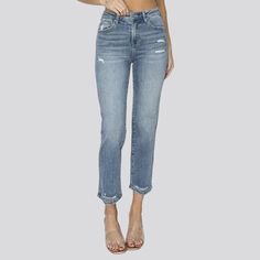 Elevate your street trend game with these slender light-wash jeans from the 2024 Summer Collection. Crafted to perfection, these vintage-inspired jeans boast a frayed and cutoff-bottom design that exudes effortless cool. The high-waist fit and stretchy fabric hug your curves for a flattering silhouette, while the zipper and button closure add a touch of sophistication.Distinctive Features: Street Style: These jeans are the perfect embodiment of street style, with a touch of vintage charm and con