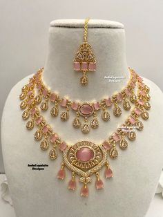 2 layered American Diamond Necklace Set in golden color comes with earrings and Tikka / CZ Necklace/Indian Jewelry/ Reception Jewelry/ Bollywood Jewelry/ 2 two tier necklace set/pink All items are shipped from Brampton, Ontario, Canada. If you need your item by a certain day, please reach out to us for express delivery option We kindly request to consider minor variations in colors, shades, textures as pictures displayed may slightly vary from the actual product due to digital image limitations. Pink Diamond Jewelry Set, Pink Jewelry For Party And Festivals, Pink Jewelry Sets For Party And Festivals, Pink Bollywood Jewelry, Festive Pink Necklace For Party, Festive Pink Party Necklace, Festive Pink Party Jewelry, Bollywood Style Pink Jewelry With Stone Work, Bollywood Style Pink Necklace For Gifts