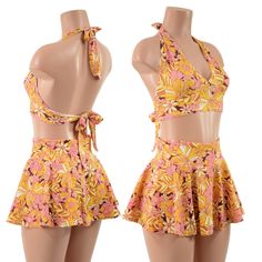 "This groovy little two piece set includes a tie back halter, and a circle cut mini skirt in our new \"What The Floral\" retro flower print. Choose 10, 12, or 15 inch length for your skirt! Made to order, ships out within five days of purchase. Womens Sizing (See below for instructions on where measurements should be taken) XXS: Bust 29\"-30\" / Waist 22\"-23\" / Hips 30\"-32\" Extra Small: Bust 31\"-32\" / Waist 24\"-25\" / Hips 33\"-35\" Small: Bust 33\"-34\" / Waist 26\"-28\" / Hips 36\"-37\" Rave Skirt, Skirt Swimsuit, Fabric Yardage, Printed Ties, Retro Flowers, Tie Backs, Retro Prints, Skirt Length, Skirt Set