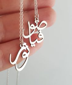 Arabic Necklace, Dainty Arabic Name Necklace, Gold Arabic Pendant,Arabic Calligraphy Jewelry, Silver Arabic Gift, Handmade Jewelry Please write in Arabic if you know. I use internet translation.  The designer designs the letters to suit the name.   If you have a special design request, please contact us.  You can send PDF. Font size is minimalist.  The design is arranged from bottom to top to best fit the letters. Traditional Silver Engraved Name Necklace, Traditional Engraved Silver Name Necklace, Handmade Jewelry As Eid Gift, Traditional Handmade Jewelry For Personalized Gift, Handmade Traditional Jewelry For Personalized Gift, Traditional Name Necklace As Gift, Arabic Name Necklace Gold, Calligraphy Jewelry, Arabic Name Necklace