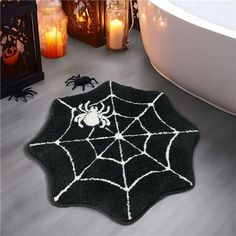 a bath room with a spider rug and candles