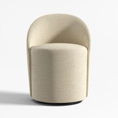 an upholstered chair on a white background with no one in the room around it