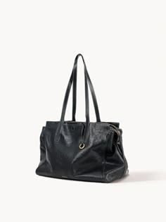 Medium Yore Duffle Bag | Luxurious Travel Essential | Unisex – Songmont Black Leather Duffle Bag With Removable Pouch, Black Rectangular Duffle Bag With Pockets, Black Rectangular Duffle Bag With Functional Pockets, Black Soft Leather Duffle Bag For On-the-go, Black Travel Bag With Detachable Handle For On-the-go, The Medium, Laptop Pocket, Dyeing Process, Neutral Fashion