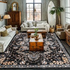 a living room filled with furniture and a large rug