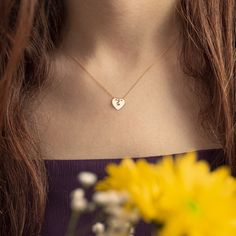 DESCRIPTION & DETAILS- Made in 14k solid gold set with a high-quality diamond (H Color, SI clarity).- Carat weight: 0.01- Chain length: 18 inches.- Pendant length: 9 mm.- Pendant width: 10 mm. MATERIALS 14k Solid GoldMade of long lasting, nature friendly recycled gold. 14k gold does not oxidize or discolor making it a perfect option for daily wear. DiamondOur diamonds are obtained through processes that follow ethically conflict-free and socially responsible practices and add value to all co Dainty Cubic Zirconia Necklace With Heart Charm, The Feeling Of Love, Tiny Heart Necklace, Feeling Of Love, Diamond Heart Necklace, Romantic Necklace, Heart Necklaces, Fine Gold Jewelry, Heart Necklace Diamond