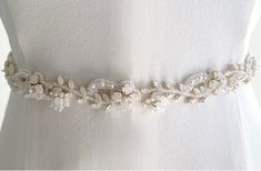 - 18 in of beading - 96 in ribbon - Standard color is Bridal White (Light Ivory) Customizable lengths and colors available! White Embellished Bridal Belt For Ceremony, Embellished White Bridal Belt For Ceremony, Wedding Sash Belt, Light Ivory, Wedding Belts, Bridal Belt, White Light, Wedding Accessories, Belts