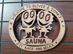 a wooden sign that says welcome to outer and ends sauna it's back and relax