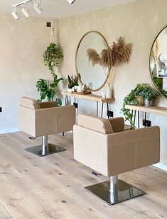 the salon is clean and ready for customers to take their own seats with plants on them