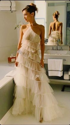 Gala Tulle Dress With Sweep Train, Tulle Dress With Sweep Train For Gala, Strapless Tulle Dress With Sweep Train, Chic Tulle Dress With Fitted Bodice, Elegant Summer Tulle Wedding Dress, Chic Long Gown With Sweep Train, Chic Gown With Sweep Train, Glamorous Floor-length Tulle Wedding Dress, Maxi Length Tulle Wedding Gown