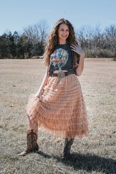 An heirloom of the American west, the Genevieve Country Boho Skirt is a cascading wonder. Featuring meticulously crafted and pin tucked details, every tier is layered with volumes of added texture complete with a high waist that flares in a flattering A-line, an elastic waistband, and luxe lining for the ultimate in elevated midis.  Perfect for lovers of the saloon west and prarie life.  Dress it up with a bodysuit or down with a graphic tee and layered beaded necklace. Promises to leave a rivet Traditional Tiered Skirt With Attached Cancan, Bohemian Tiered Tulle Skirt, Bohemian Tiered Skirt With Attached Cancan, Bohemian Lined Skirt For Wedding, Bohemian Wedding Skirt With Lining, Bohemian Lined Wedding Skirt, Bohemian Skirt With Attached Cancan, Bohemian Tiered Wedding Skirt, Boho Country Outfits