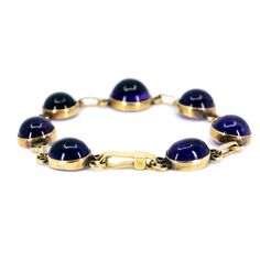 This mesmerizing link bracelet feature cabochon-cut ±30.00ct Amethyst crafted in 18ct. Design Era: Mid-Victorian (1856-1880)., sizeable (within reason). Dimensions: L 19 cm x W 1.5 cm.. Weight in grams: 19.6. Condition: Very good condition - slightly used with small signs of wear. Resizing possible (contact seller for information). Registered Shipping or Local Pickup at our store (in case of Local Pickup; shipping cost if applicable will be refunded). Looking for more antiques & vintage jewe Luxury Amethyst Bracelets For Formal Occasions, Yellow Gold Cabochon Bracelet As Gift, Gold Cabochon Bracelets For Formal Occasions, Formal Purple Oval Cabochon Jewelry, Antique Gemstone Bracelets For Formal Occasions, Formal Amethyst Jewelry, Oval Cabochon, Formal Round Amethyst Bracelets, Formal Amethyst Round Bracelets, Formal Cabochon Bracelet Jewelry