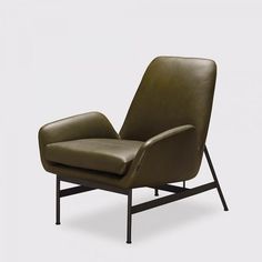 a brown leather lounge chair with black metal legs and arm rests on a gray background