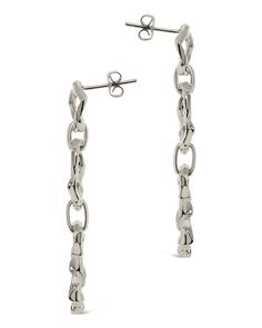 You don't want to blend in, and these bold drop earrings will help you stand out! These feature a trio of organic molten links that secure with a sturdy post back. Available in gold and silver tones. Materials: 14K gold or rhodium plated brass Features: 2" drop, 0.45" width, 0.4" stud, Lead & Nickel free, post back Modern Sterling Silver Link Earrings, Modern Oval Link Metal Earrings, Modern Link Shaped Metal Earrings, Modern Metal Earrings With Hook Style, Modern Metal Earrings With Hooks And Links, Modern Everyday Link Earrings, Modern Chain Link Earrings For Everyday Wear, Modern Earrings With Polished Oval Link, Modern Dangle Earrings With Hook And Links