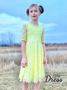 A new addition to our twirly lace collection. So soft and fully lined with our regular dress material. This pastel yellow dress has half sleeves and of course pockets! Spring Lace Dress With Lace Bodice For Dress-up, Fitted Lace Dress For Dress-up In Spring, Spring Flowy Dress With Scalloped Lace, Flowy Scalloped Lace Dresses For Spring, Spring Flowy Scalloped Lace Dress, Spring Lace Dress For Dress-up Occasions, Spring Lace Dress For Confirmation, Spring Confirmation Dress With Lace Bodice, Spring Confirmation Lace Dress