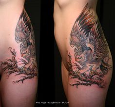 an eagle tattoo on the side of a woman's thigh and leg, with branches around it