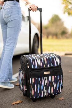 "Buy the Everything Mary Black Abstract Stripes Rolling Craft Bag at Michaels. com. This scrapbook rolling tote features a telescoping locking handle and a durable wheelset for secure craft storage. The Everything Mary Collapsible Rolling Craft Bag was made with crafters in mind. The Everything Mary Collapsible Rolling Craft Bag is the ultimate storage solution for any storage need you may have. This rolling organizer cart is constructed with durable polyester and features premium zippers, pipin Art Carry Case, Tech Storage Bag Craft, Craft Storage Totes, Cricut Maker Tasche, Art Supplie Bag, Rolling Craft Storage Tote, Essex Rolling Cart By Simply Tidy, Gift Bag Storage Cart, Art Bags Supplies