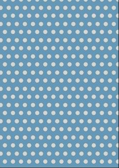 a blue background with white polka dots