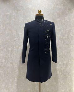 *2  Piece Navy blue :- Sherwani and Pant  *Fabric: %100 japanese , Thick, Warm,  Comfortable, Breathable, Softer, Satin Feeling *Center Hide Button Sherwani , With Zipper Fly Pants *This Suit Has A 6" Drop Which Is The Difference Between The Size Of The Sherwani & Pants. For Example, A 40r Jacket Includes A 34W Pant *Dry Clean Only Important Note: All Our Products Are Made To Order ! Please Contact Us For Perfect Fitting Suit. .Full Lining Indo-western  With Padding *We are proud to offer a wide Designer Blue Kurta With Intricate Embroidery, Designer Blue Traditional Wear With Dabka Work, Designer Embroidered Bandhgala With Straight Kurta, Festive Designer Sherwani With Floral Embroidery, Designer Blue Sets With Dabka Detailing, Formal Nehru Jacket With Floral Embroidery And Straight Cut, Formal Nehru Jacket With Floral Embroidery And Straight Fit, Formal Straight Nehru Jacket With Floral Embroidery, Designer Blue Sherwani With Dabka Work