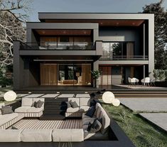 a modern house with an outdoor seating area