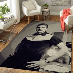 a living room area rug with a photo of a man in black and white on it