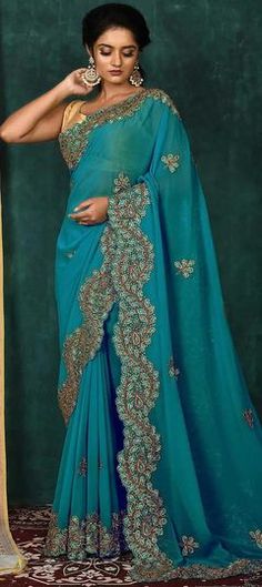 Blue color Saree in Georgette fabric with Cut Dana work Turquoise Resham Embroidery Saree For Wedding, Blue Saree With Intricate Embroidery, Blue Resham Embroidered Saree For Wedding, Blue Bollywood Saree With Intricate Embroidery, Blue Saree With Resham Embroidery For Wedding, Blue Resham Embroidery Saree For Wedding, Blue Embroidered Fabric With Zari Work For Reception, Bollywood Style Blue Saree With Intricate Embroidery, Blue Cutdana Saree For Wedding