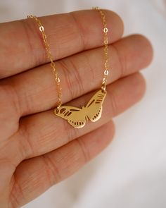 Our Metamorphosis Butterfly Necklace is the perfect accessory to transform any outfit! Crafted with either 18k Gold or Sterling Silver, this customizable necklace features a butterfly design that you can engrave with two initials for a personalized touch! NECKLACE FEATURES Choice of material: Solid High-Quality .925 Sterling Silver. Finish: 18k Gold or Sterling Silver Cable chain is sterling silver or 14K gold filled. Choose to engrave the butterfly with two initials, or leave it blank for a sle Stainless Steel Butterfly Necklace Gift, Butterfly Shaped Rose Gold Jewelry For Gifts, Butterfly Shaped Rose Gold Jewelry Gift, Rose Gold Butterfly Jewelry For Gifts, Rose Gold Butterfly Jewelry Gift, Elegant Gold Butterfly Charm Necklace, Dainty Yellow Gold Butterfly Jewelry, Dainty Butterfly Yellow Gold Jewelry, Butterfly Charm Pendant Jewelry Gift For Her