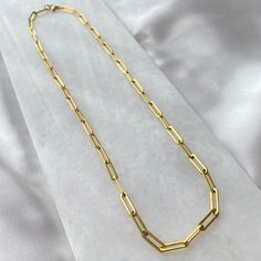 Dainty paperclip chain link necklace . Hypoallergenic, tarnish resistant and water resistant. color: gold base metal: medical grade stainless steel length: 19.5 inches Gold Choker, Chain Link Necklace, Link Necklace, Paper Clip, Base Metal, Chain Link, Arrow Necklace, Gold Bracelet, Chain Necklace