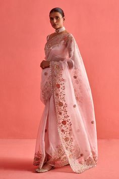 Powder pink saree in organza base with carnation flora bloom thread embroidery highlighted with mukaish and brass coins embellishments. Paired with a sleeveless sweetheart neck matching mashru silk padded blouse and petticoat. - Aza Fashions Pink Organza Traditional Wear With Cutdana, Pink Sheer Dupatta Traditional Wear In Organza, Party Saree With Chikankari Embroidery In Tissue Silk, Party Saree With Chikankari Embroidery On Tissue Silk, Designer Organza Pre-draped Saree With Dori Work, Party Tissue Silk Saree With Chikankari Embroidery, Elegant Pre-draped Saree With Dori Work In Organza, Organza Dupatta For Reception In Transitional Season, Festive Organza Traditional Wear With Chikankari Embroidery