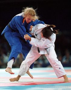 two women compete in a karate match