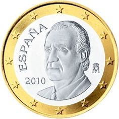 an image of a coin with a man's face on the front and side