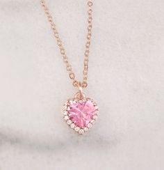 "This heart initial necklace is made with your choice of a 10mm Pink, Aqua Blue or Olive Green and clear cubic zirconia heart which hangs on an 18-inch rose gold-plated cable chain. Just pick your heart crystal color in the drop down menu. Thank you for looking. NOTE: This listing is for one necklace with one pendant, but you can choose to purchase just the pendant without the chain (see drop down menu). The \"Pendant Only\" option includes the pendant with a bail/top loop and no chain. The beau Valentine's Day Birthstone Heart Pendant Jewelry, Valentine's Day Heart Pendant Jewelry With Birthstone, Heart-shaped Cubic Zirconia Birthstone Necklace, Heart-shaped Birthstone Necklace In Cubic Zirconia, Rose Gold Heart Necklace With Cubic Zirconia, Rose Gold Cubic Zirconia Heart Necklace, Rose Gold Heart Cut Cubic Zirconia Necklace, Valentine's Day Heart-shaped Birthstone Necklaces, Rose Gold Pendant Heart Necklace