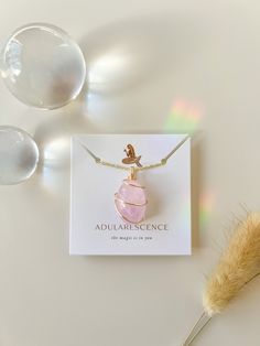 Morganite | divine love, compassion and connection Each pendant is lovingly hand-sourced and artfully wire wrapped to compliment the natural beauty of each crystal. Every pendant purchase includes a complimentary gold-plated brass wire. The morganite gemstone is approximately 26 carats. Rose Quartz Pendant Necklaces For Healing, Rose Quartz Pendant Necklace For Healing, Rose Quartz Crystal Necklace For Healing, Rose Quartz Gemstone Pendant Necklace, Healing Rose Quartz Gemstone Necklace, Rose Quartz Pendant Necklace With Natural Stones, Rose Quartz Pendant Crystal Necklace With Natural Stones, Rose Gold Rose Quartz Hand-wrapped Jewelry, Hand Wrapped Rose Quartz Jewelry In Rose Gold