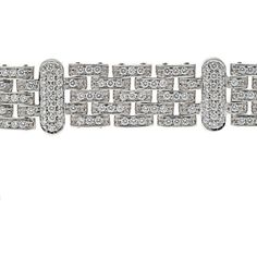 Savor the journey through the world of exquisite detailing and design in this breathtaking 18K White Gold 10.00 carat total weight Five Row Diamond Link Ladies Bracelet. Crafted with meticulous attention to detail, this bracelet is a masterpiece that exudes luxury and sophistication.Each of the five rows features dazzling round diamonds set in a secure link design, creating a harmonious flow of brilliance and elegance. The total carat weight of 10.00 carat total weight ensures a captivating sparkle that will mesmerize onlookers with every movement.The bracelet is approximately 20mm wide, making it a statement piece that commands attention and complements any outfit effortlessly. It is secured with a box clasp adorned with a safety feature, ensuring both style and peace of mind.Meticulously Luxury Diamond Bracelet Jewelry, Luxury Diamond Bracelet Strap Jewelry, Luxury Diamond Bracelet For Formal Occasions, Luxury Diamond Bracelet For Formal Events, Luxury Platinum Bracelet With Pave Setting, Luxury Diamond White Diamond Bracelet For Formal Occasions, Luxury White Gold Chain Bracelet With Pave Setting, Luxury Diamond Chain Bracelet For Anniversary, Luxury Platinum Jubilee Bracelet