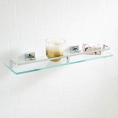 PRICES MAY VARY. Covered under Signature Hardware's 10 year limited Constructed of glass All hardware required for installation is included Mounting brackets are adjustable to desired width Tempered glass thickness 1/4" The Albury Collection Tempered Glass Shelf is both a contemporary accent and a functional storage space, and will be the perfect addition to any bathroom. Create a cohesive look in your bathroom with other Albury Collection pieces. Signature Hardware 916705 Features: Covered unde Glass Shower Shelves, Signature Hardware Bathroom, Glass Bathroom Shelves, Bathroom Furniture Storage, Floating Shelves Bathroom, Glass Theme, Tempered Glass Shelves, Chrome Bathroom, Glass Shelf