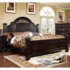 a bedroom scene with focus on the bed and dresser