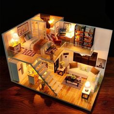 a doll house with furniture and lights in it