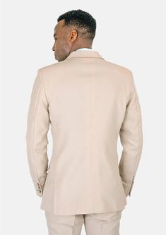 Make an impression in this custom-made Prince Champagne Cotton Suit. Crafted from a soft yet durable champagne cotton, this sophisticated suit will help you look and feel confident while exuding a polished, stylish air. Stand out in any setting with this fancy, chic suit. Elegant Beige Sport Coat With Lapel Collar, Beige Elegant Sport Coat With Lapel Collar, Fitted Luxury Beige Sport Coat, Luxury Fitted Beige Sport Coat, Tailored Elegant Cream Sport Coat, Elegant Cream Sport Coat With Notch Lapel, Fitted Beige Blazer For Wedding, Fitted Beige Wedding Blazer, Tailored Cream Sport Coat