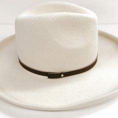 A thin leather hat band that is dark brown. The hat band has a gold pin. Pictured on ivory felt hat. Gigi Pip, M And M, Leather Hat, Giddy Up Glamour, Leather Hats, Hat Pin, Felt Hat, Hat Band, Leather Band