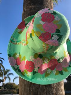 "Super Pretty! Just love the mint green on this tropical print sunhat and the pink flowers look gorgeous against the green. This stunning wide brim sunhat has a large, foldable brim that not only frames your face beautifully when folded up, but protects your face from the sun when the brim is down. I fell in love with this gorgeous fabric while on a weekends getaway, so you will be wearing a very unique and stylish wide brim hat. This sunhat is not only perfect for those sunny days, but absolute Pink Summer Sun Hat For Garden Party, Adjustable Floral Print Sun Hat For Beach, Adjustable Floral Print Sun Hat For The Beach, Spring Beach Sun Hat With Floral Print, Summer Floral Print Sun Hat For Vacation, Beach Sun Hat With Floral Print And Curved Brim, Multicolor Wide Brim Sun Hat For Garden Party, Summer Beach Hats With Floral Print, Multicolor Sun Hat For Summer Garden Party