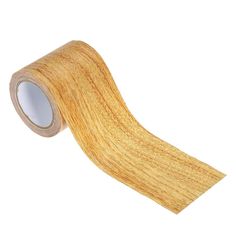 a roll of woodgrain tape on a white background