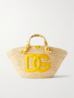 Dolce & Gabbana's 'Kendra' tote celebrates the "ancient ceramics of Caltagirone". It's woven from raffia and detailed with a large leather logo, plus silk-twill wrapped like a scarf around the handles. The joyful design makes it the perfect choice for summer and you'll have plenty of space for your essentials - think phone, wallet and your current book. Ancient Ceramics, Joyful Design, Porter Bag, Raffia Tote Bag, Garda Lake, Wine Vineyards, Flat Dress Shoes, Delicious Pasta, Lake Garda