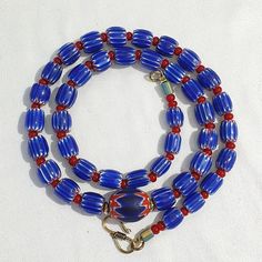 Vintage Venetian White heart With Blue Glass Chevron Beads Necklace. Other Names Chevron Beads SIX Layer Type of Object Drawn, multi-layered glass Color BLUE, RED, White  Approximate Age Late 20th century Overall  * Condition: Good to fair.  * See picture with Size measurement tool for size comparison.  * Strand Length22 inches * Brand: Unbranded  * Style: Beaded  * Type: Necklace This strand is not intended to be a ready-to-wear necklace. Although the strand can be worn as is, th 12 Point Star, Chevron Beads, Star Mold, Object Drawing, Wear Necklaces, Size Comparison, Trade Beads, Measurement Tools, Glass Color