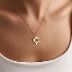 The Minimal Sun necklace stands out as a unique piece of handmade astrology and celestial symbolic jewelry. It is adorned with minimalistic design elements inspired by the sun. This elegant gold sun necklace will reflect your brightness on those wonderful days. MATERIAL 14kt Gold-Filled jewelry is crafted by bonding a plated layer of 14kt gold onto another metal. However, this layer is 1000 to 10,000 times thicker than gold plating. As a result, it creates a durable, long-lasting product that re