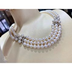 Highlight: Beautiful Natural White Akoya Pearls Product Information OriginJapan MaterialAkoya Pearl, 18k White Gold, and Diamond Clasp DimensionsNecklace Length 45 cm Pearl Shaped: Round Size: 6-7.5 mm Quality: AAA Nacre: Very Thick Color: White Luster: Very High Accessories Metal: 8.5 g 18k White Gold Other: 1.60 ct of SI Quality Natural Diamond Luxury Round Bridal Necklace For Evening, Elegant Jewelry With Round Beads For Evening, Elegant Round Beads Jewelry For Evening, Luxury High Luster White Pearl Necklace, Exquisite Round Bridal Necklace For Evening, Exquisite Bridal Necklace For Evening, Luxury Bridal Necklace For Formal Occasions, Luxury Pearl Necklace With 17 Jewels, Luxury High Luster Pearl White Pearl Necklace