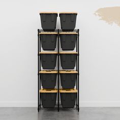 a shelving unit with several bins on it