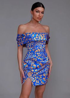 Expertly crafted with a retro digital print, this off shoulder mini dress is the perfect addition to your wardrobe. Made with luxurious satin fabric, it's stylish, comfortable, and sure to make a statement. With its unique off shoulder design, in a beautiful blue hue, you'll be turning heads wherever you go. Fabric: Non-Stretch Material: Polyester Fiber Blue Off-shoulder Mini Dress For Summer, Spring Blue Off-shoulder Mini Dress, Glamorous Blue Off-shoulder Mini Dress, Off-shoulder Printed Mini Dress For The Beach, Off-shoulder Floral Print Mini Dress For Night Out, Shoulder Bones, Flared Mini Skirt, Pleated Mini Skirt, Retro Prints