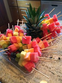 fruit skewers with pineapple, watermelon and grapes